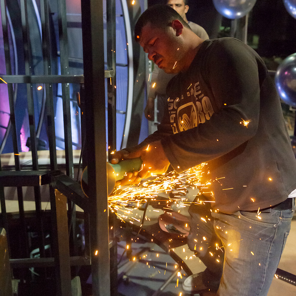 photo, shebab happily cutting away unnecessary setpieces