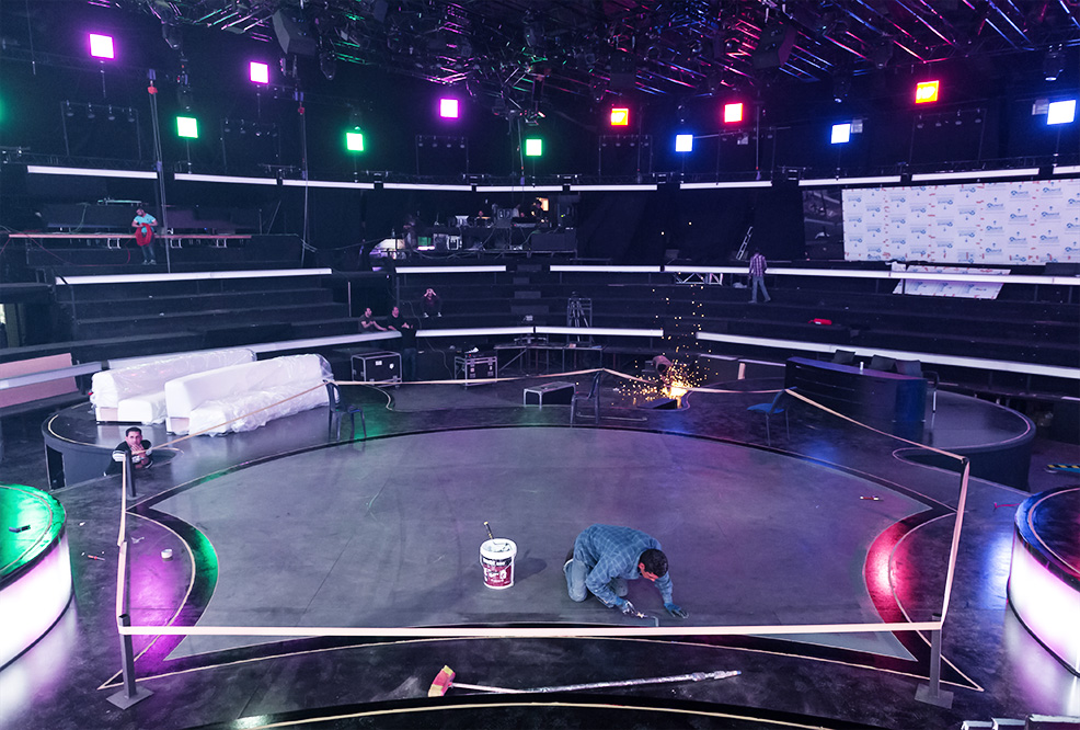 photo, set painter detailing part of the stage