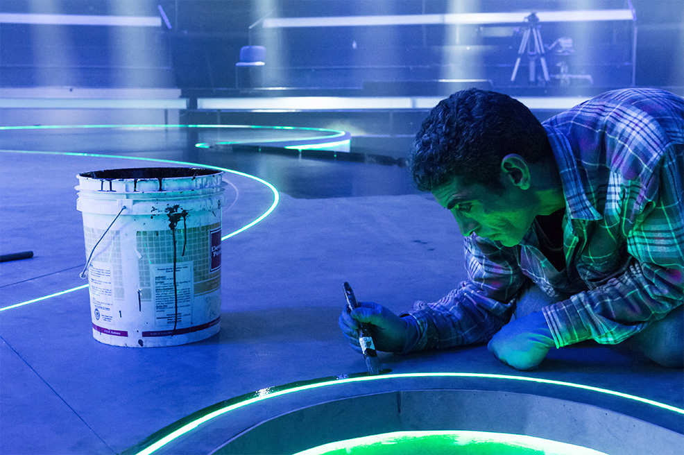 photo, set painter detailing part of the stage